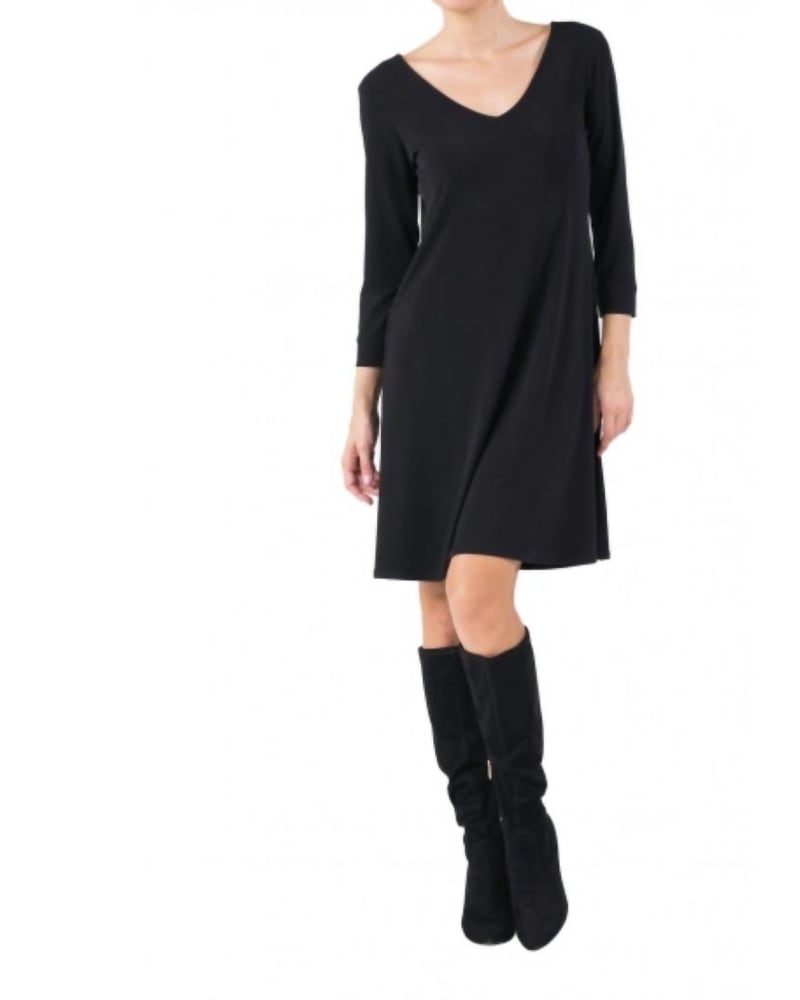 Front of a model wearing a size Large 3/4 Sleeve Scoop Neck A Line Dress in Black in Black by eva varro. | dia_product_style_image_id:339142